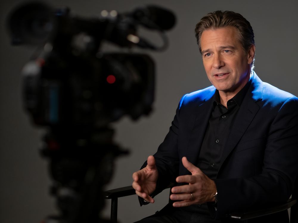 An expert being filmed for an interview